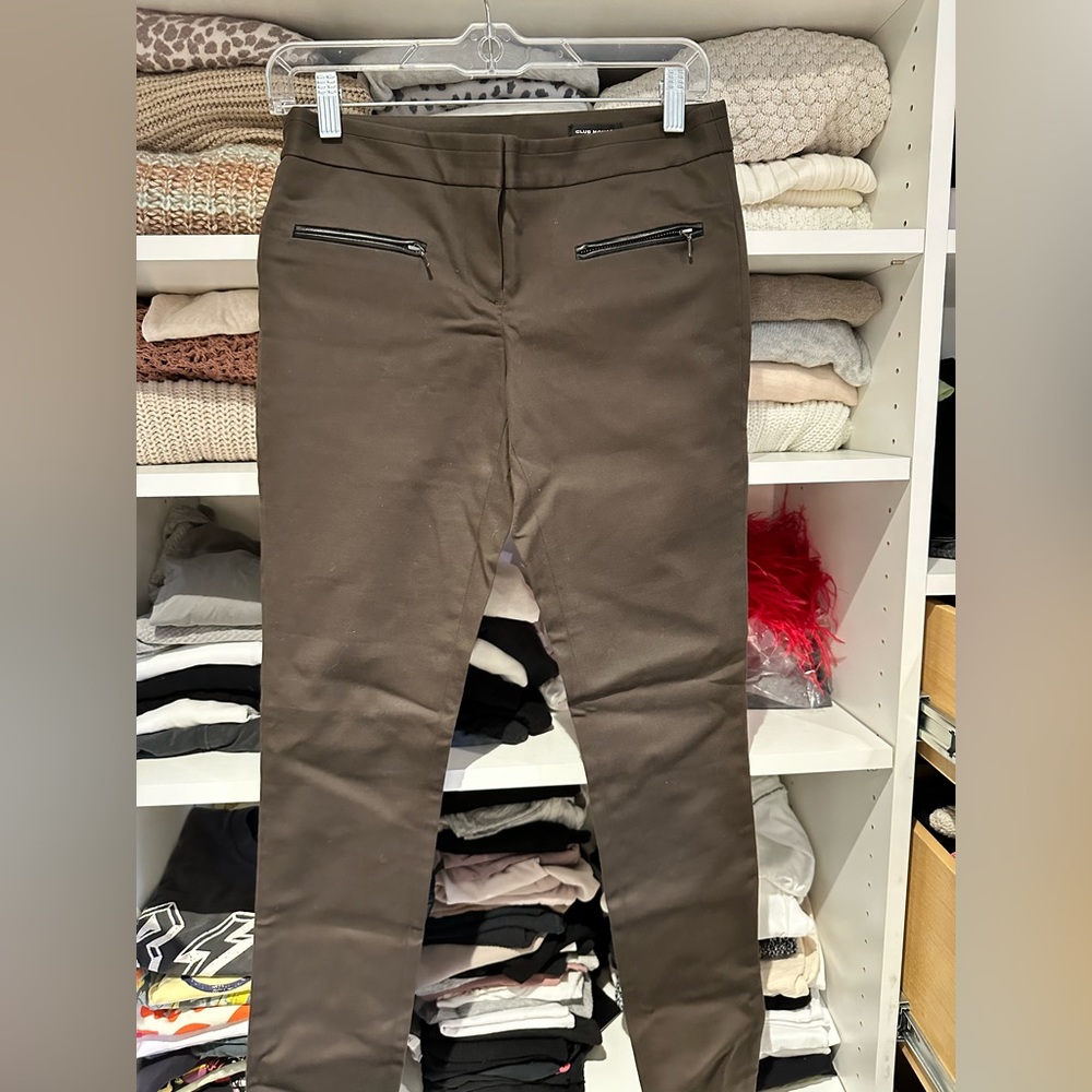 Brand new with tags, leather trim pockets